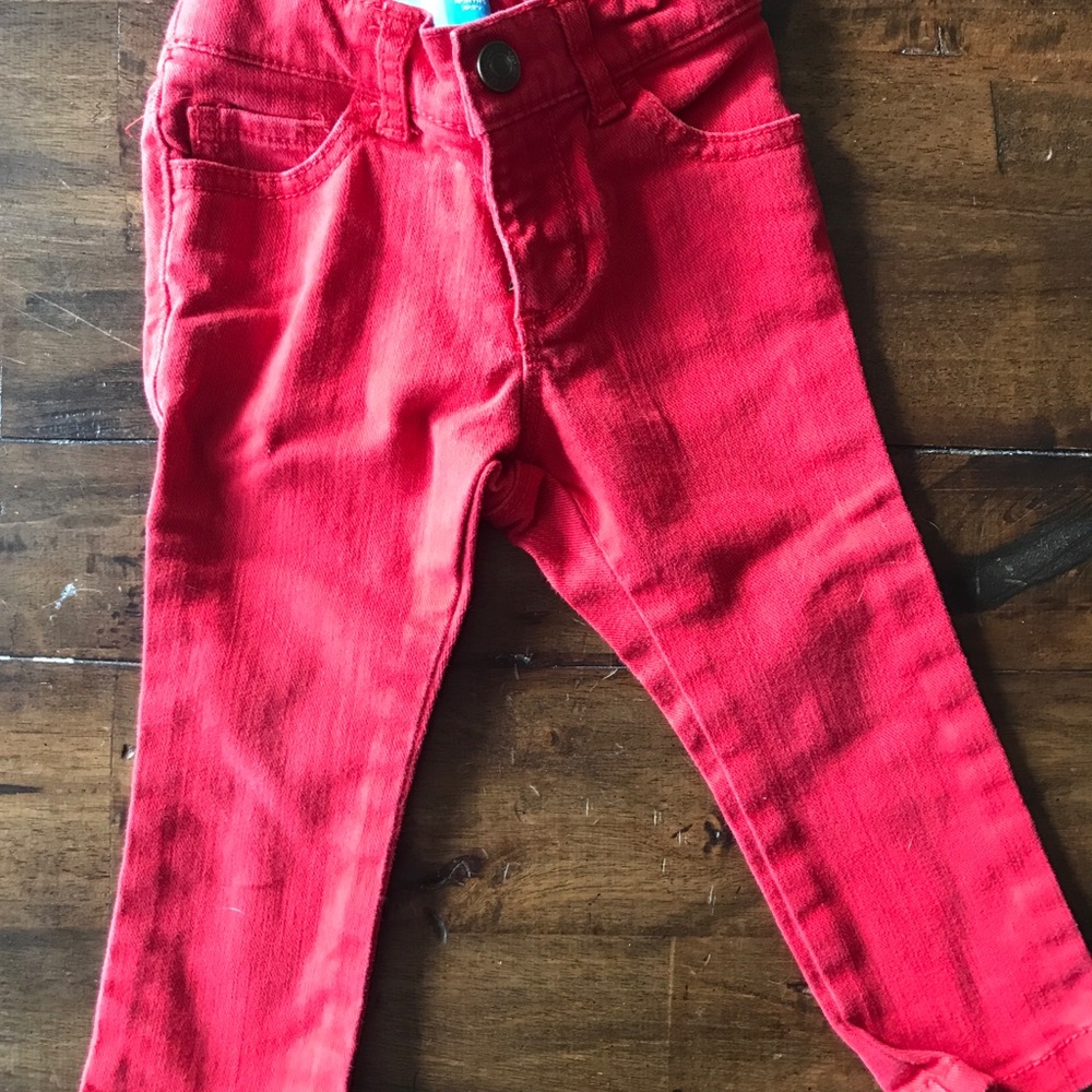 Red and black skinny jeans